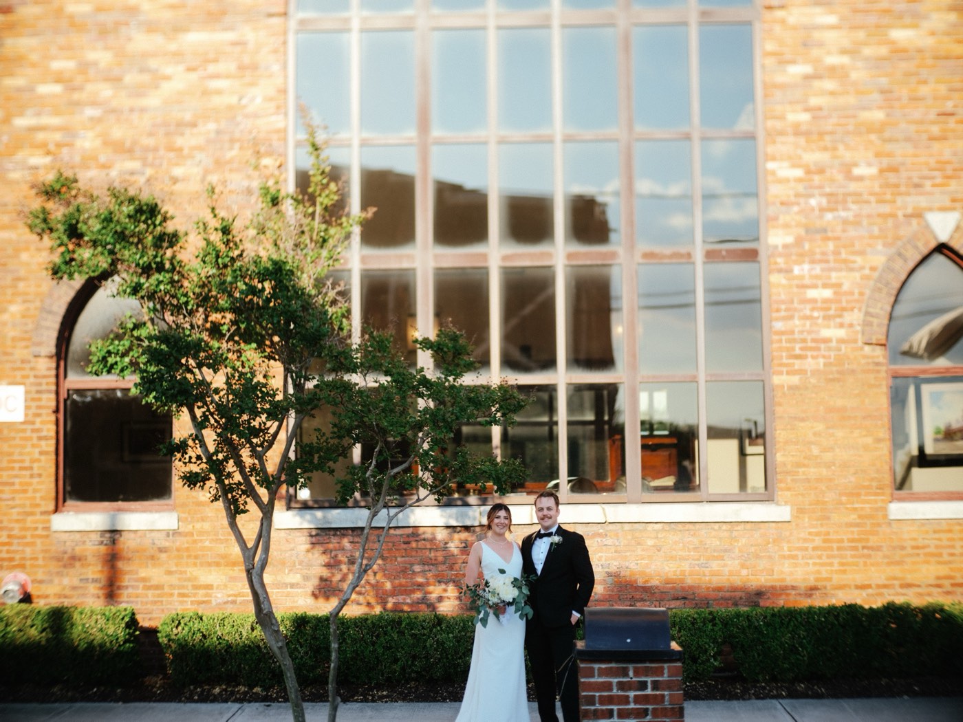 A wedding business owner reviewing notes on referrals, networking, and client experience.